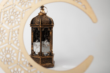 Ramadan Mubarak, moon and lantern on white background, Islamic tradition, holy month