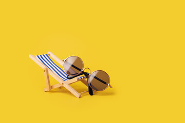 Sunbed with sunglasses, beach relaxation, summer vacation vibes, sunbathing chair