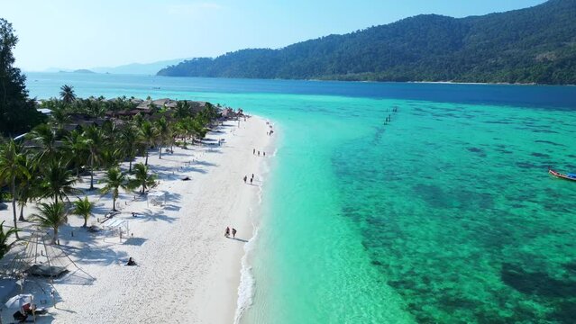 turquoise blue sea thai beach rocky island. Breathtaking aerial top view drone