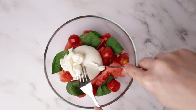 Fresh burrata cheese paired with juicy tomatoes and aromatic basil, Italian cuisine