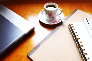 Home office and coffee cup.