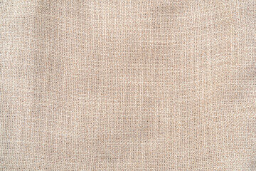 Hessian sackcloth woven jute burlap fabric cloth textile texture pattern background in brown beige aged color - 744678739