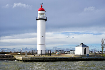 At the harbor mouth is one of the oldest working lighthouses in the Netherlands.
Hellevoetsluis, Hellevoet, Voorne aan Zee, South Holland, Netherlands, Holland, Europe.

