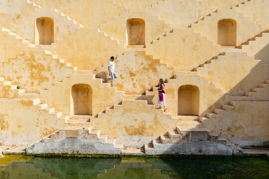 Couple at ancient stepwell in Jaipur