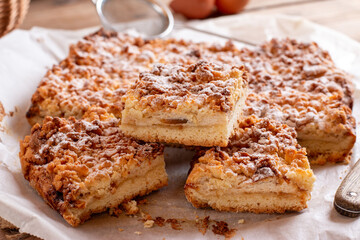 Homemade pie stuffed with jam on a table close-up, selective focus