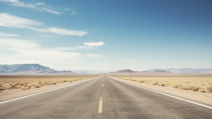 Empty asphalt road in the desert. Long straight asphalt road leading to the desert