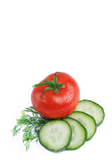 Cucumber slices and tomato  isolated on the white background
