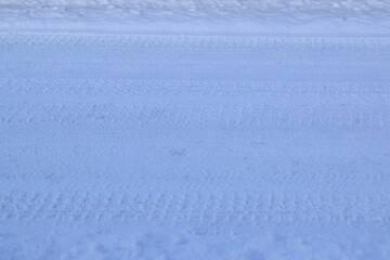 tire tracks in the snow