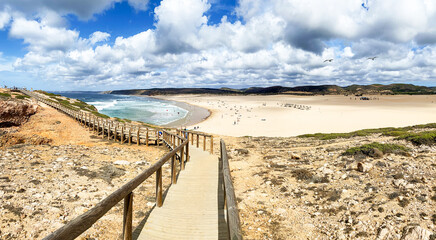 View to coastline with beautiful and sunny portuguese surfer beach Praia da Bordeira near Carrapateira in summer, Aljezur Algarve Portugal - obrazy, fototapety, plakaty