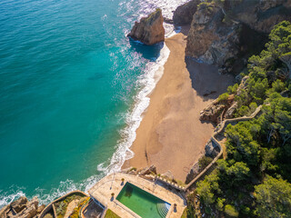 Secluded Paradise: Aerial Perspectives of Illa Roja's Nudist Beach and Untamed Nature
