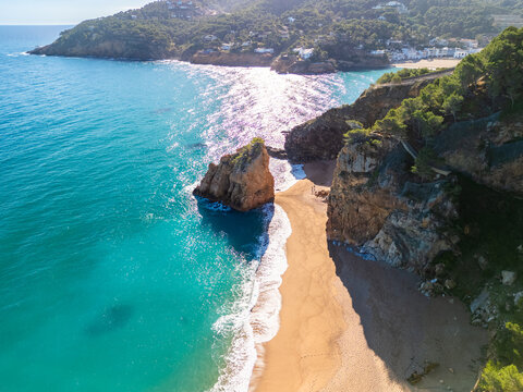Nature's Embrace: Aerial Glimpses of Illa Roja's Nudist Beach and Coastal Wilderness
