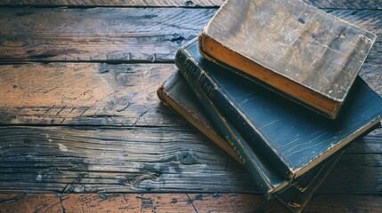 Antique Leather-Bound Books Stacked on Rustic Wooden Table