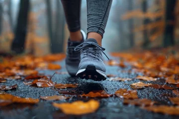 Foto op Plexiglas Forest Jogging, Forest Fitness Stride: Lifestyle Close-Up, Running Shoes on Trail, Action Shot Capturing Movement and Determination in the Natural Surroundings of an Outdoor Jog © Thanate