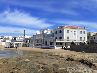Fototapeta na wymiar Panorama di Punta Secca, la casa del Commissario Montalbano sulla spiaggia in riva al mare.