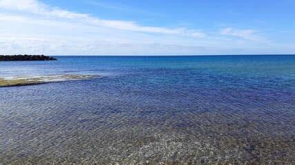 Fototapeta na wymiar I colori del mare di Punta secca: azzurro, blu, turchese.