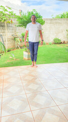 Man practicing calisthenics exercises at home