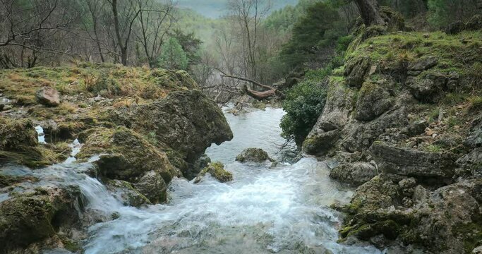 Idyllic winter scene with fog from the Mundo River at its source, Riopar, Albacete, Castilla la Mancha, Spain