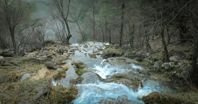 Idyllic winter scene with fog from the Mundo River at its source, Riopar, Albacete, Castilla la Mancha, Spain