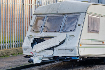 Caravan abandoned and dumped in street waiting to be removed