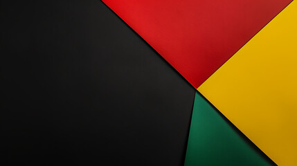 Geometric abstraction in black, red, yellow, and green, providing a powerful background for Black History Month with ample space for text.