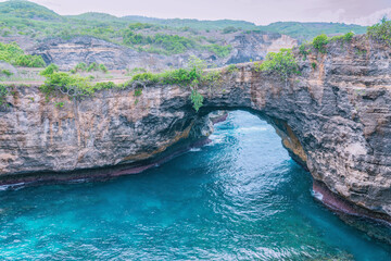 Scenic close up photo of natural bridge at broken beach - top attraction tourist spot with...
