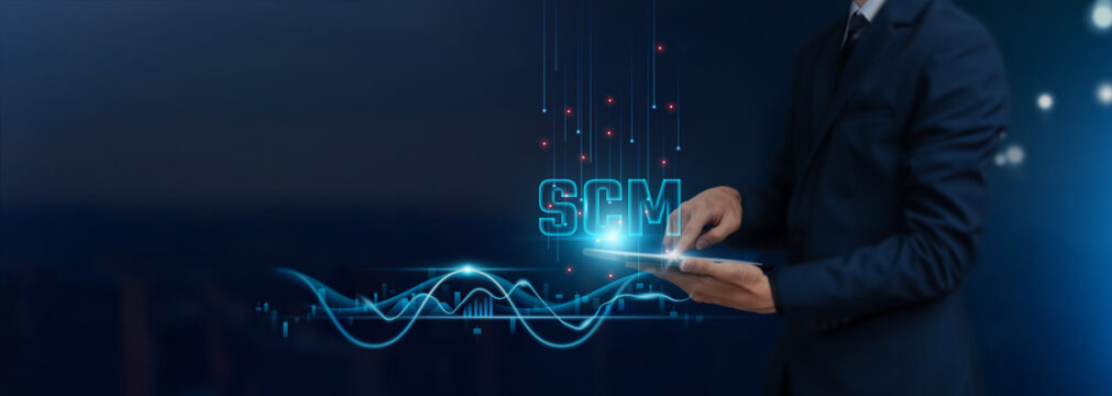 SCM: Supply Chain Management Concept, Businessman Uses Tablet on SCM Icon Global Networking, Optimization, Efficiency, Integration Develop Smart Solutions from Digital Technology.