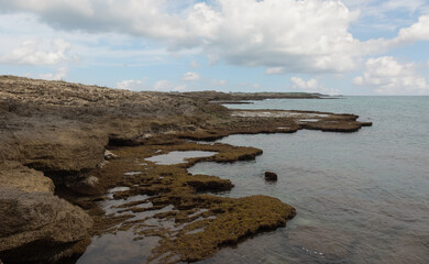Beautiful Mediterranean coast against the background of clouds