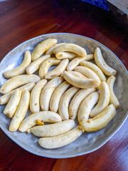 photo of peeled banana on a tray