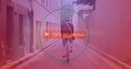 Play icon with increasing subscribers against african american senior man riding bicycle