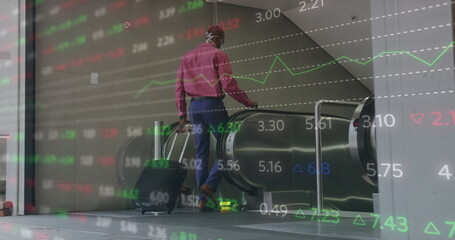 Image of financial data processing over african american man in face mask using escalator