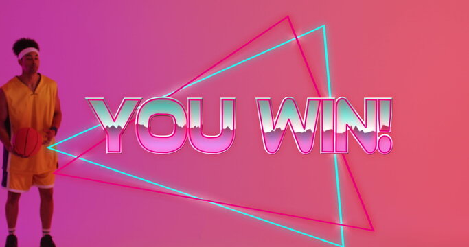 Image of you win text over neon pattern and biracial basketball player