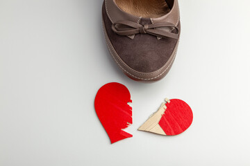 Heartbreak under Heels The Symbolism of Love Crushed