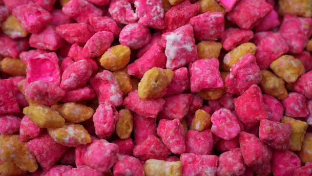 Experience the delectable array of homemade desi sweet snacks at the vibrant village fair, showcasing traditional treats bursting with flavor and culture