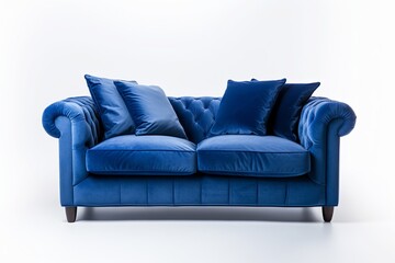 Modern navy blue sofa with pillows on isolated white background. Furniture for modern interior design
