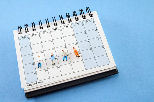 Concept of four-day work week. Printed calendar for a 4 day working week