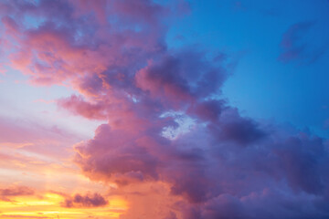Blue sky with orange clouds. Sunset scenery. Bali island, Indonesia. Wallpaper background. Natural...