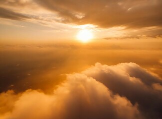 Sun goes into the clouds. Epic sunset in the sky, aerial shot. Flying above the clouds . Travel Background with Copy Space.