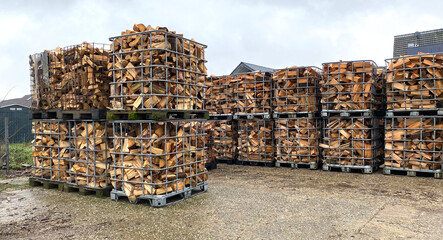 Many Prepared container firewood storage outside package store