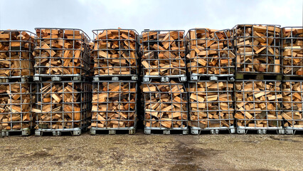 Many Prepared container firewood storage outside package store