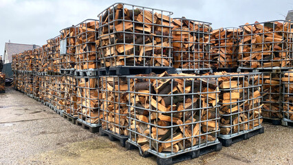 Many Prepared container firewood storage outside package store