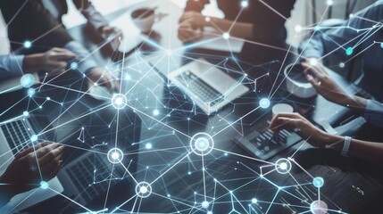 Group of People Working on Laptops at Table