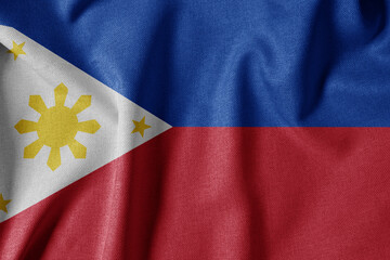 National Flag on Textured Fabric Background. Silk textured flag, realistic wave and flag look. PH  Flag of The Philippines