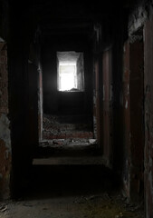 one Old underground stone tunnels. Halloween Locations. Dark stone tunnel illuminated by a beam of...