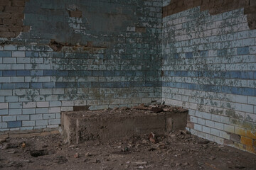 angle in industrial dirty room interior. old blue ceramic tile floor with crack texture. Concrete...