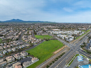 Fototapeta na wymiar Drone photos over vacant land in a community in a community in northern California. Green space vacant land. Commercial Real Estate