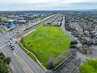 Drone photos over vacant land in a community in a community in northern California. Green space...