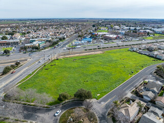 Drone photos over vacant land in a community in a community in northern California. Green space...