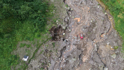 aerial view of sand and stone mining on the slopes of Mount Merapi in Sleman Regency, Yogyakarta