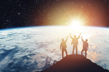 Silhouette of three people on the background of the planet, success concept. Elements of this image furnished by NASA