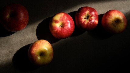 Red apples. Colorful apples in close-up on a dark background. Fine art photography.